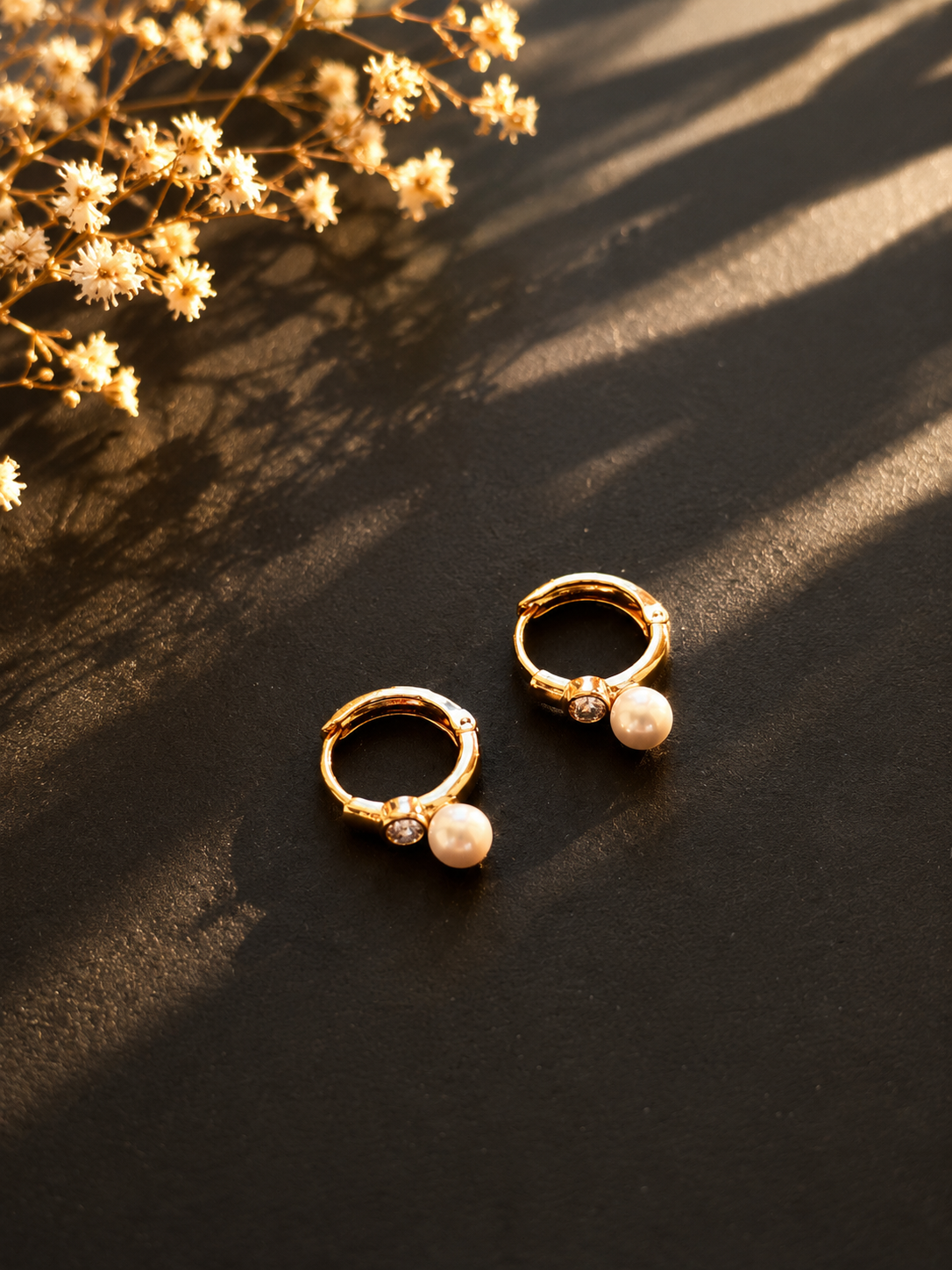 Gold-plated earrings with a pearl