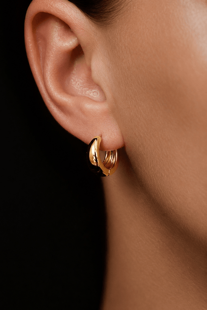 14k gold-plated hoop earrings on the ear