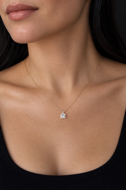 18k gold-plated necklace with a square pendant on the model's neck