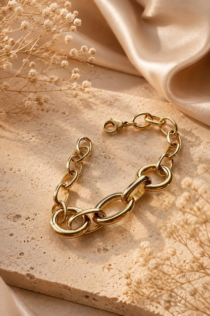 18k gold plated expressive link bracelet on light luxury background