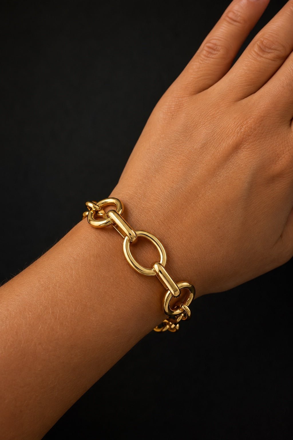 18k gold plated statement bracelet on black background