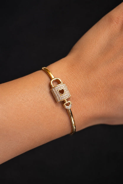18k gold plated solid bracelet with lock and heart design on arm