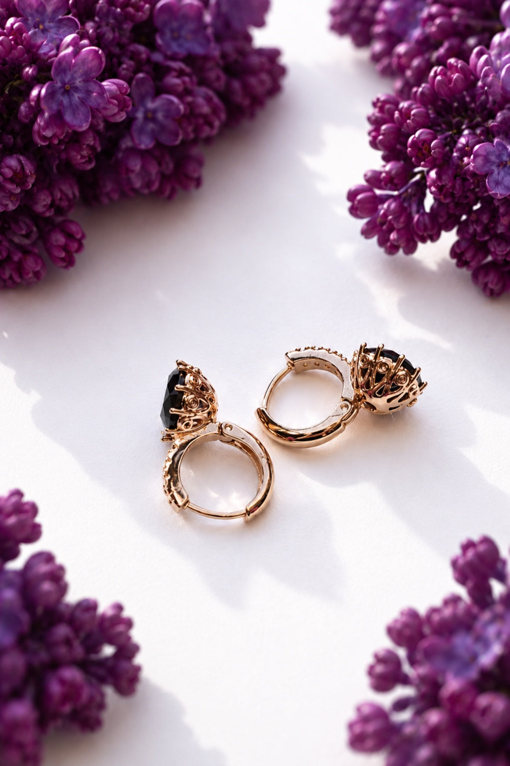 18k gold-plated earrings with black zirconia and purple lilacs