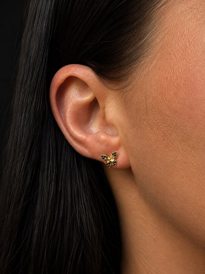 18K gold plated butterfly stud earrings with black cubic zirconias on the ear