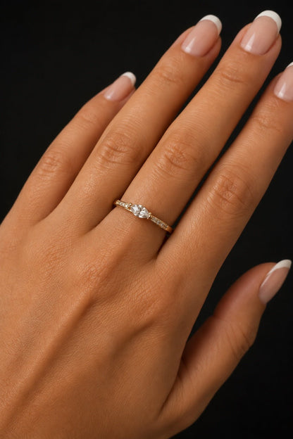 18k gold-plated delicate ring with marquise-shaped zirconia on the hand
