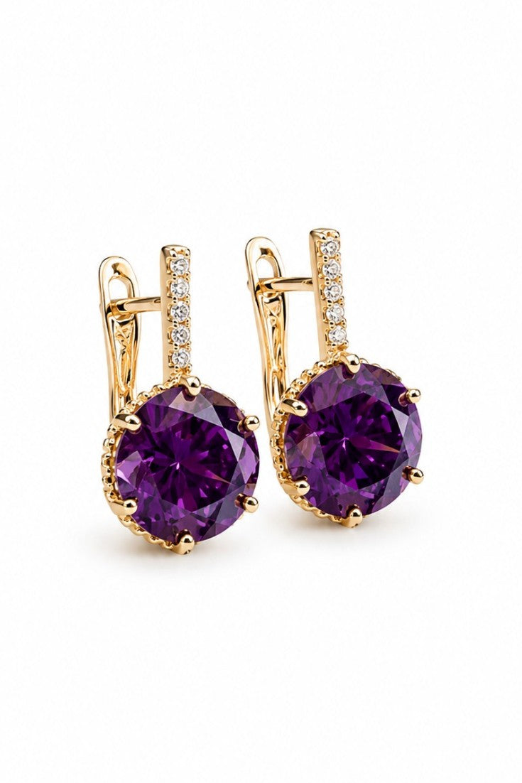 Amelia anti-allergic gold-colored earrings with violet zirconia on a white background