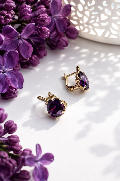 Amelia gold-colored earrings with purple zirconia and purple lilacs