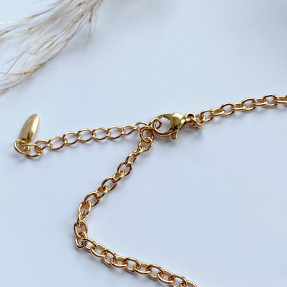 Gold-plated bracelet with a cross - ,