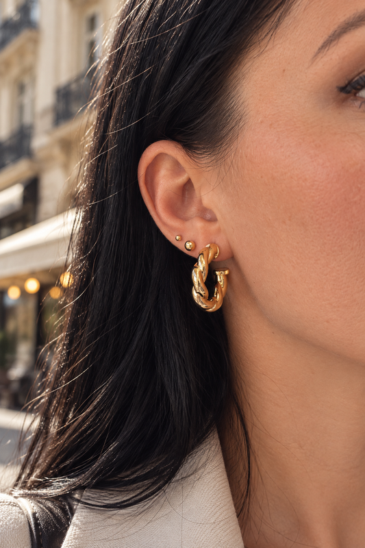 Gold-plated stud earrings with twisted pattern