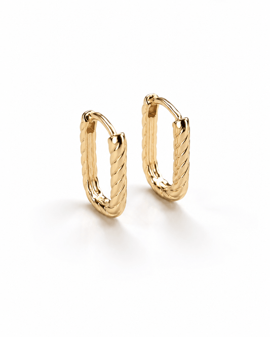 18k gold-plated twisted design oval hoop earrings on a white background