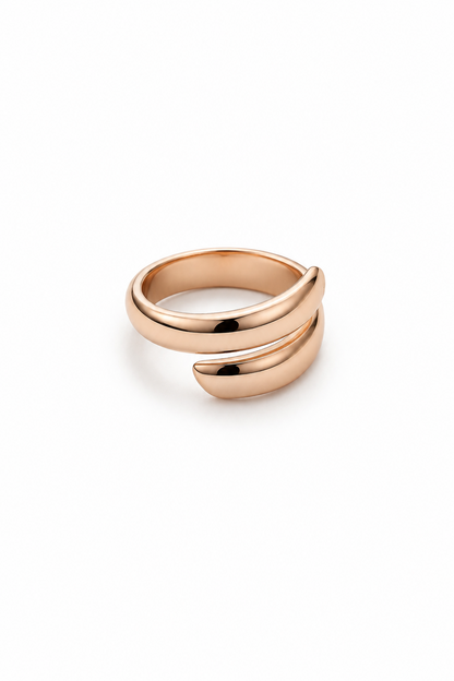 Gold plated wide open design ring on white background