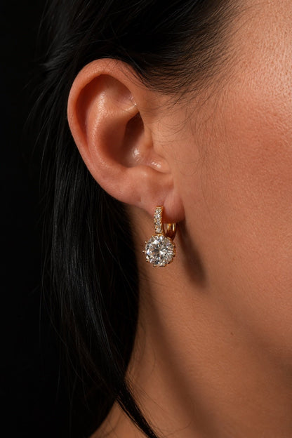 Dita – 18k gold-plated hoop earrings with a large round cubic zirconia on the ear