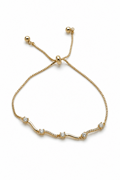 Elvira – 18k gold-plated adjustable bracelet with zircons on a white background