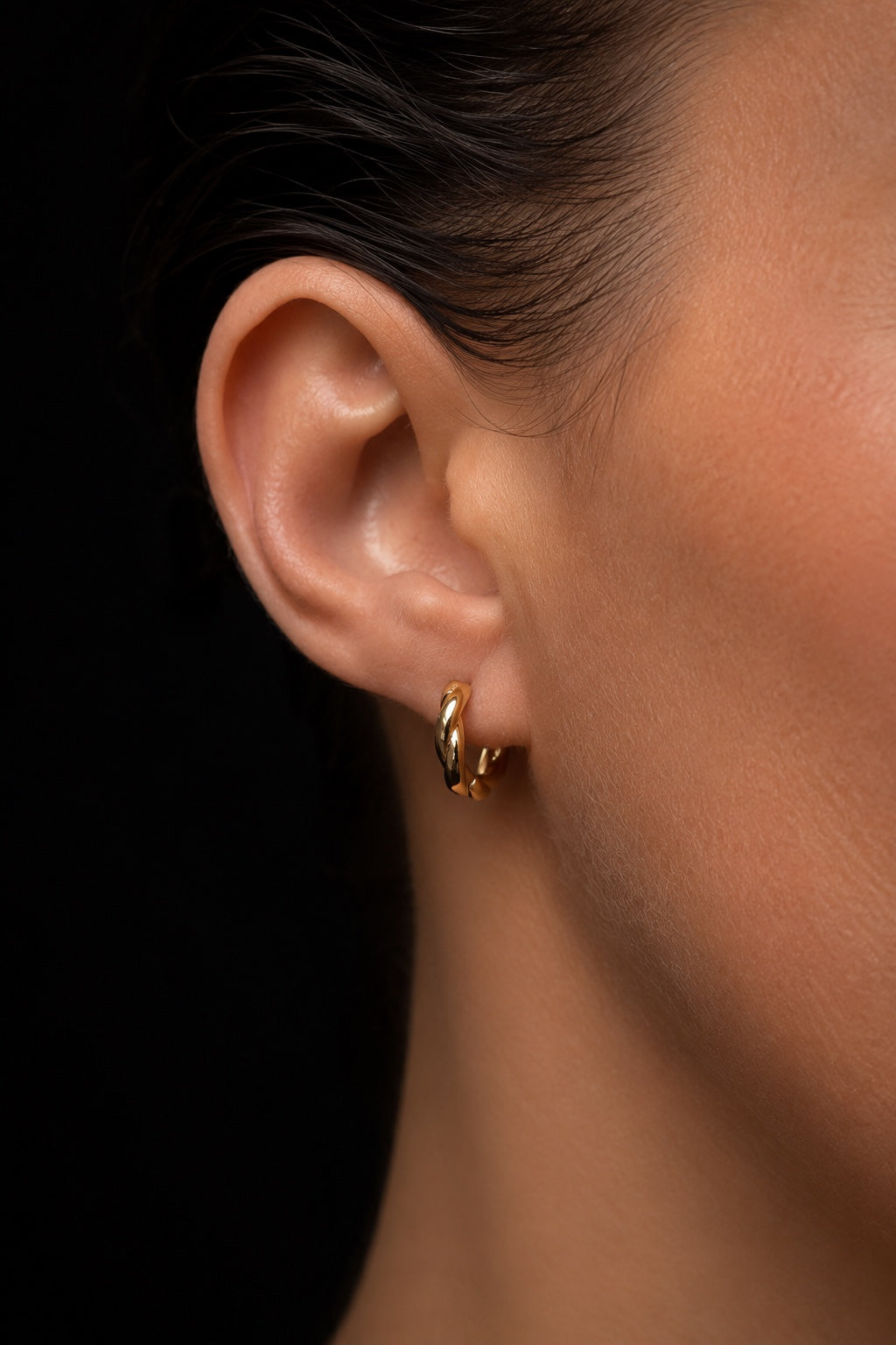 Marta 18k gold-plated mini twisted hoop earrings 12 mm on the ear