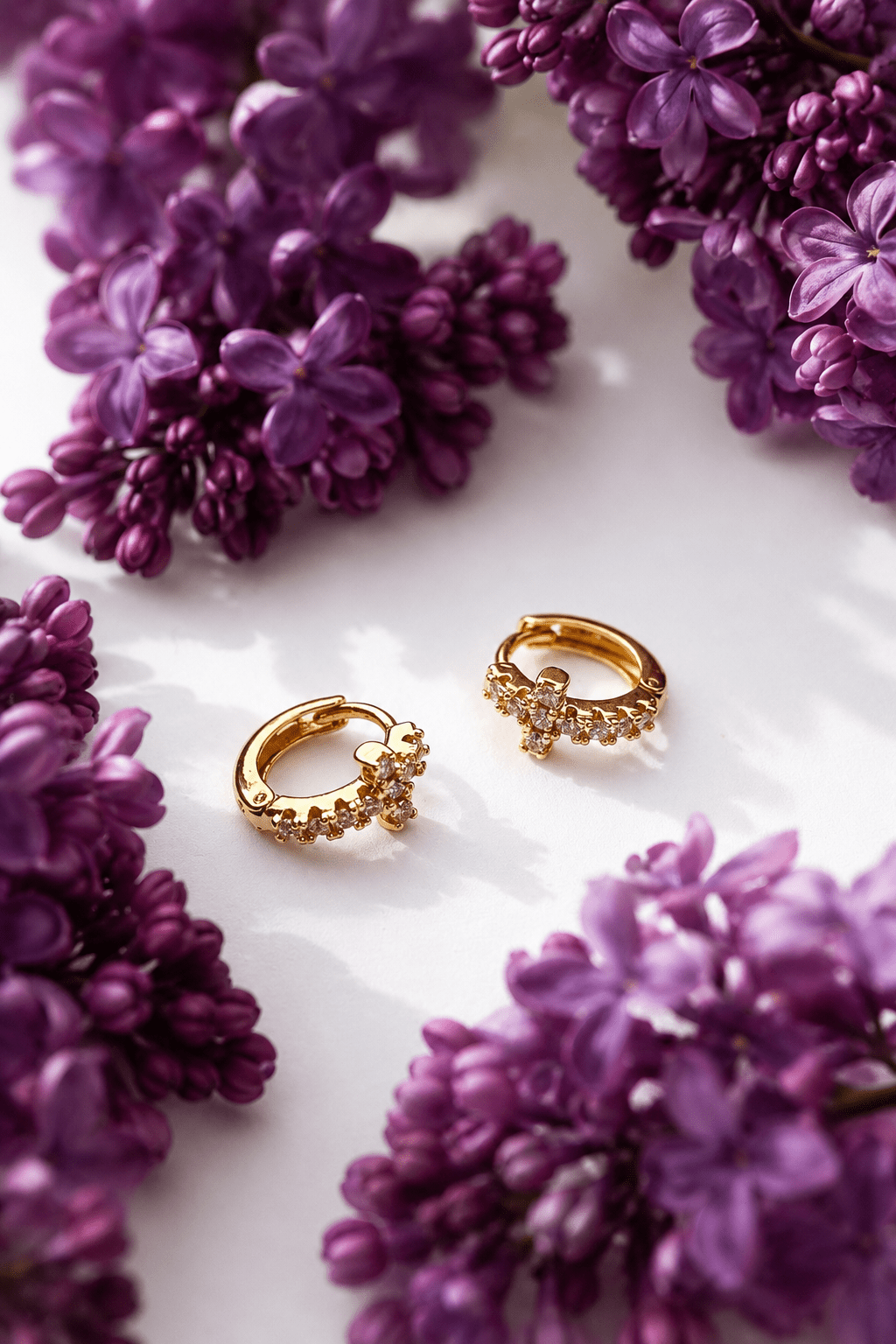 Katrina mini hoop earrings with zirconia cross lifestyle photo