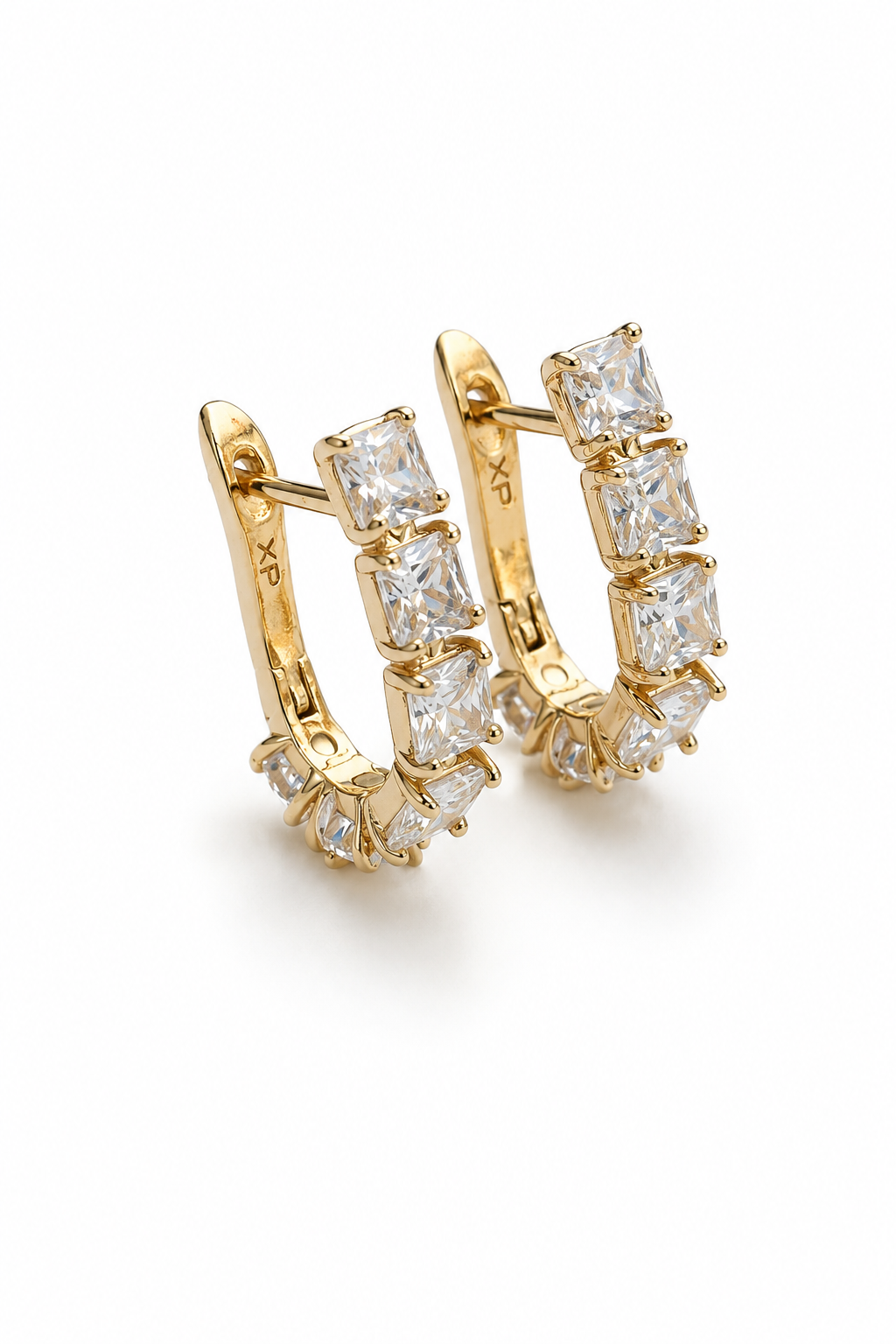 Sparkling 18k gold-plated earrings with square cubic zirconias on a white background
