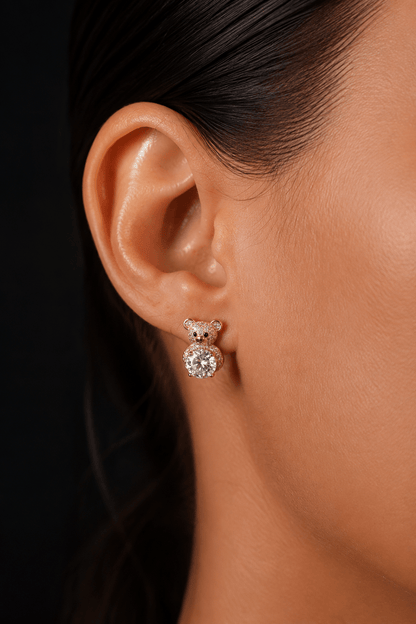 Stud earrings with teddy bear and zirconia on the ear