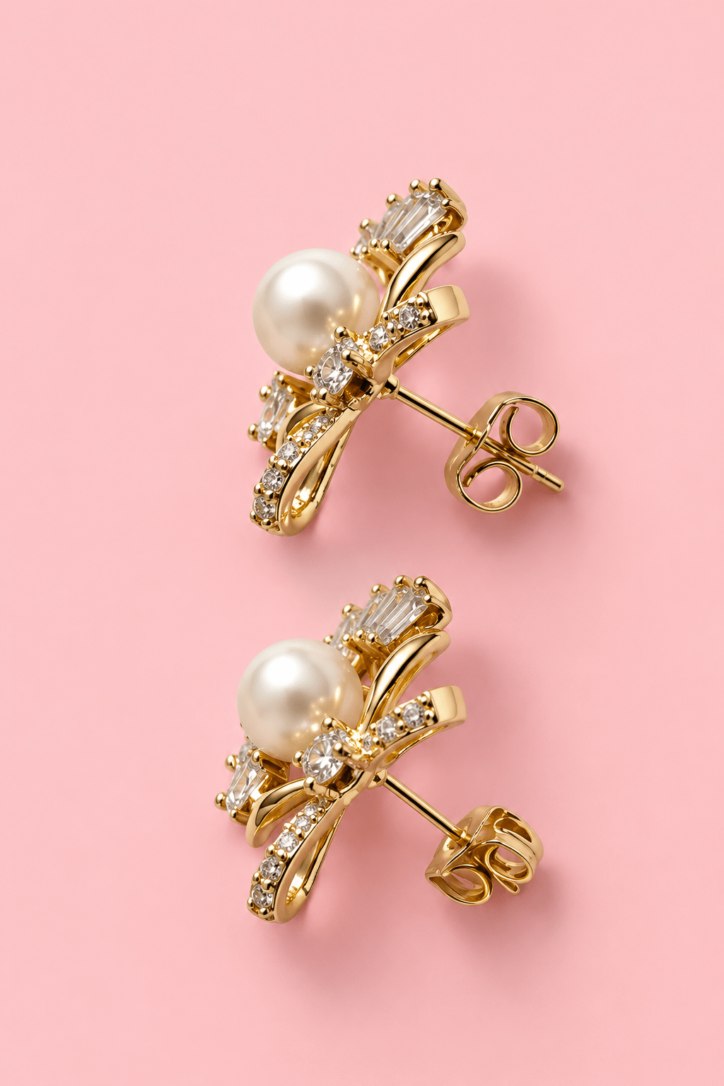 Stud earrings with pearls and secure closure