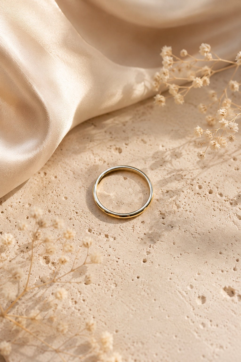 Fine 18k gold-plated ring on a light elegant background