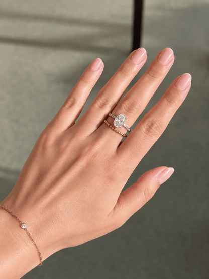 Fine gold-plated ball ring in combination with other rings