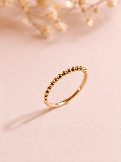 Fine gold plated ring with 2mm ball design close up