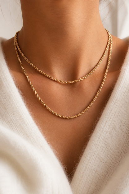 Gold-tone twisted rope chain necklace worn on the neck – lifestyle photo